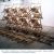 Installation avec chaises et bambou en équilibre - Koldo Mixelena - 1997